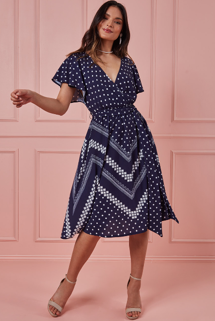 Navy wrap top over dress